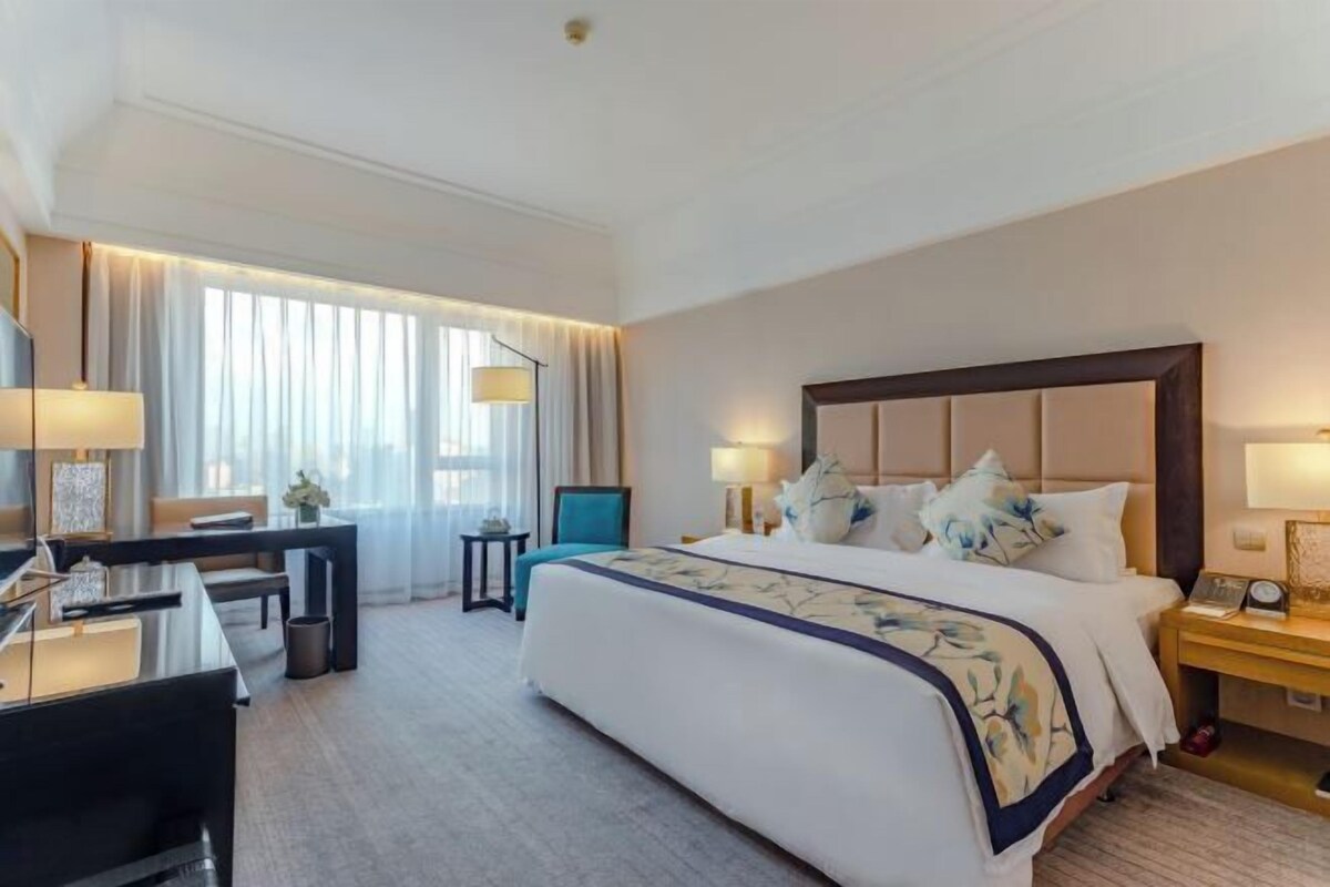 Ropa de cama de alta calidad, edredón y artículos del minibar gratis