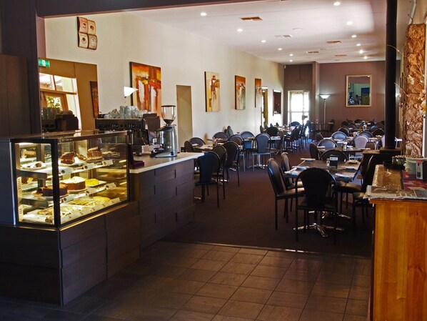 Breakfast, lunch, dinner served; international cuisine, garden views