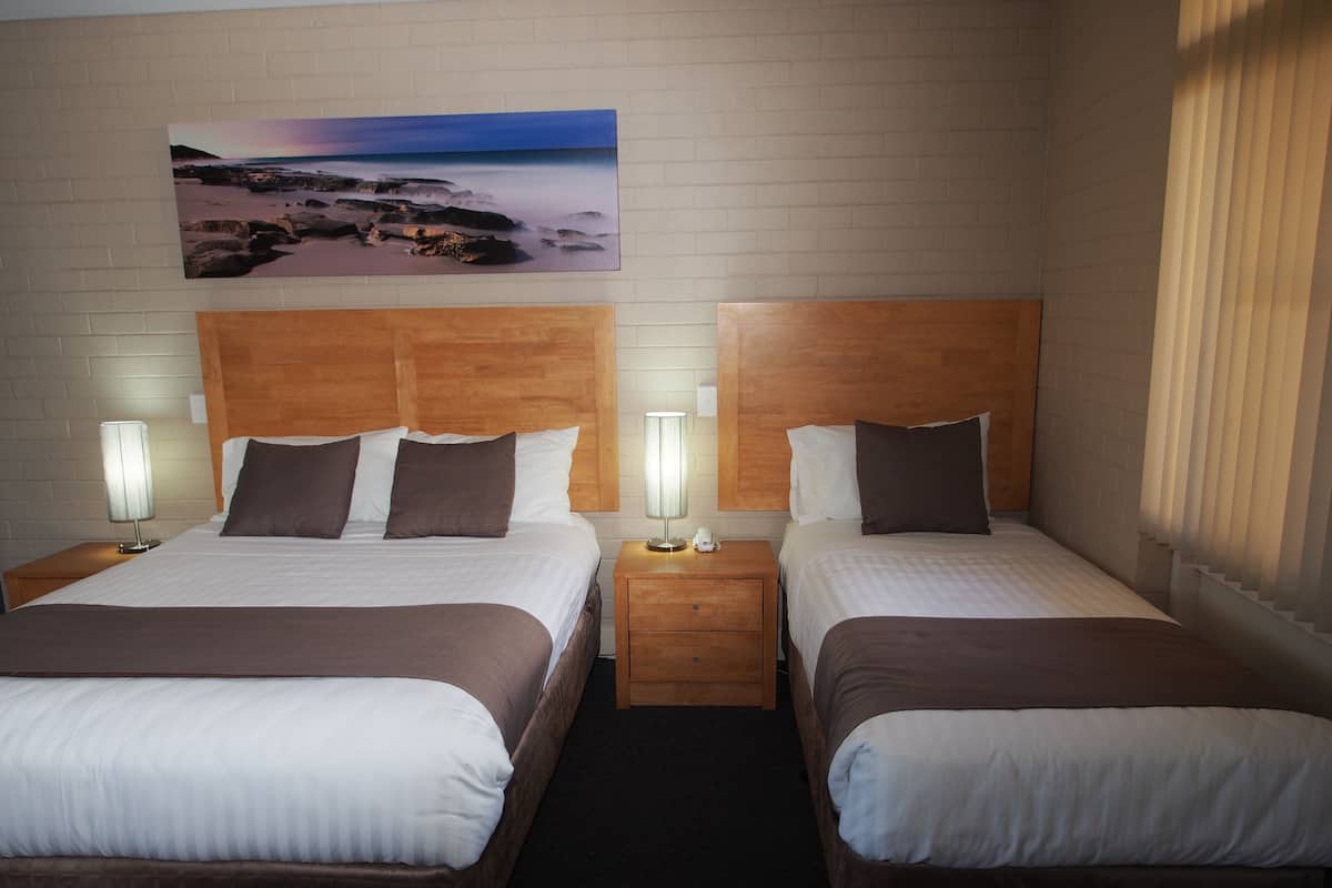 Premium bedding, down duvets, iron/ironing board, cots/infant beds
