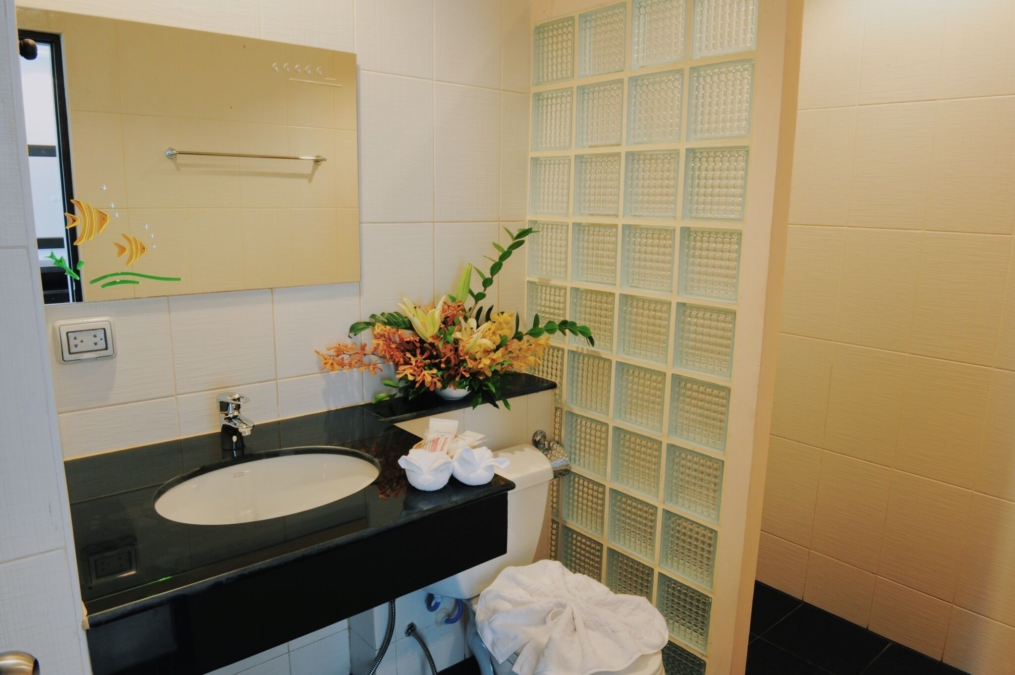 family room | bathroom | shower, hair dryer, bidet, towels