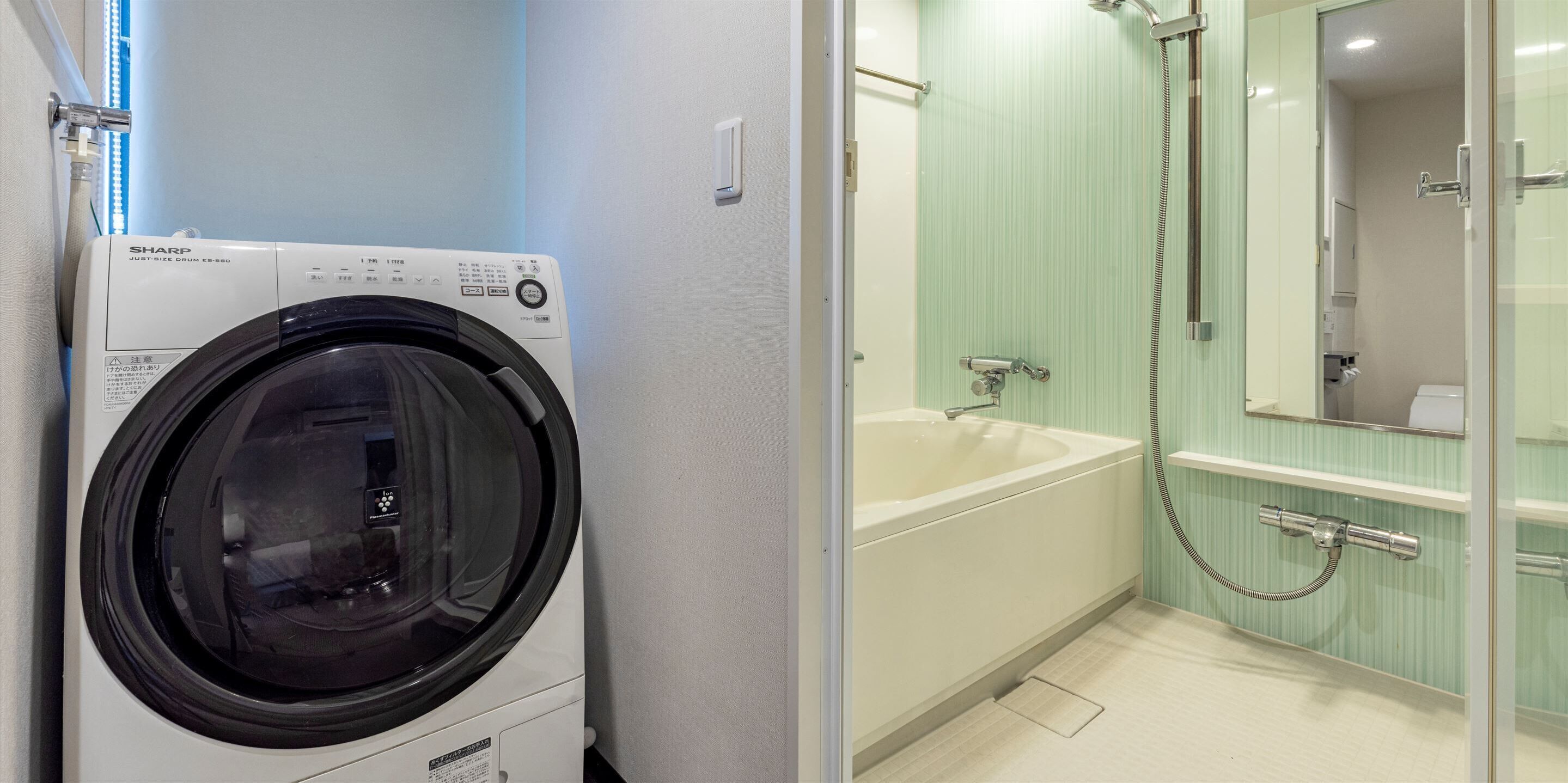 combined shower/bathtub, hair dryer, slippers, electronic bidet