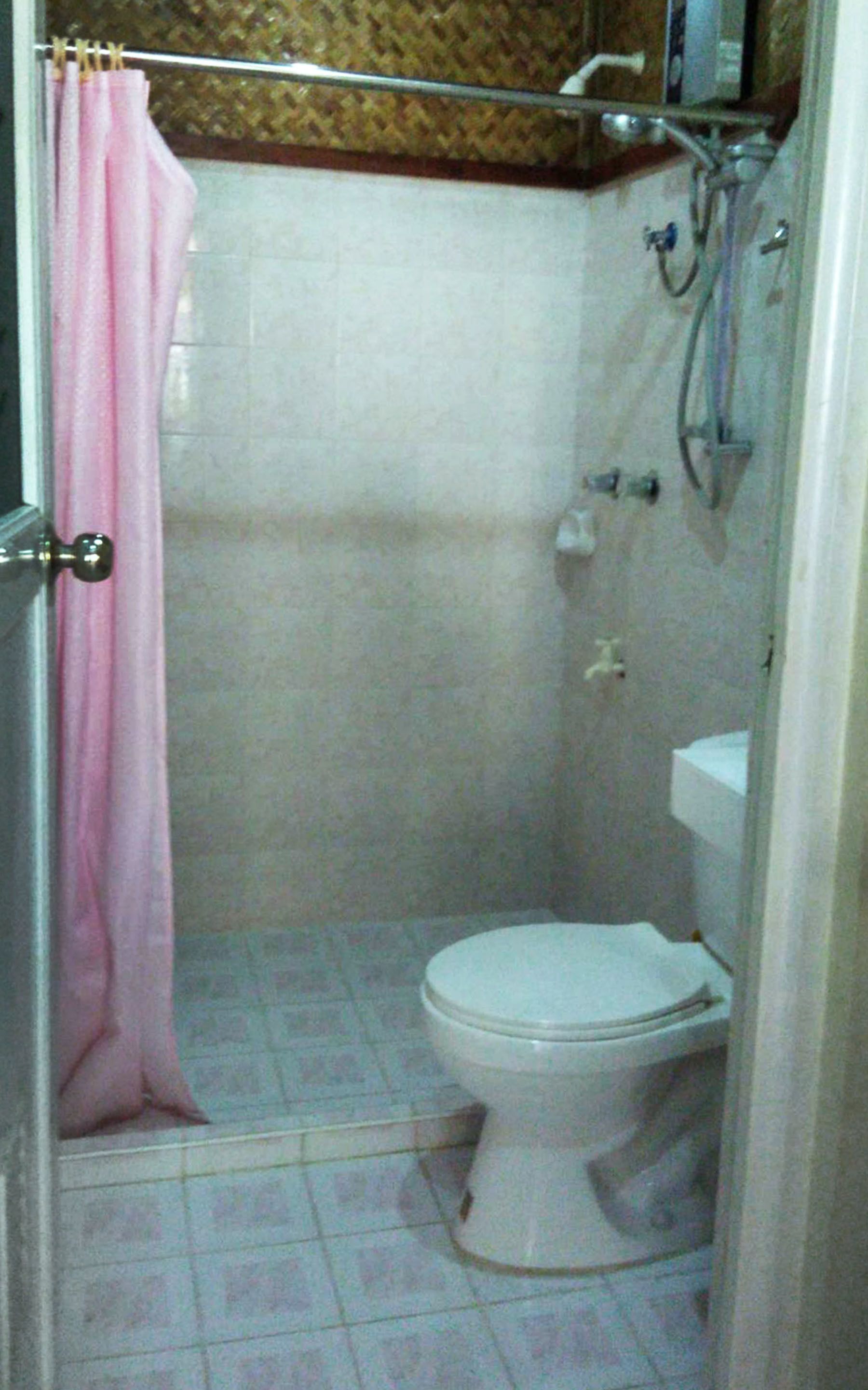 deluxe aircon room | bathroom | shower, hair dryer, towels