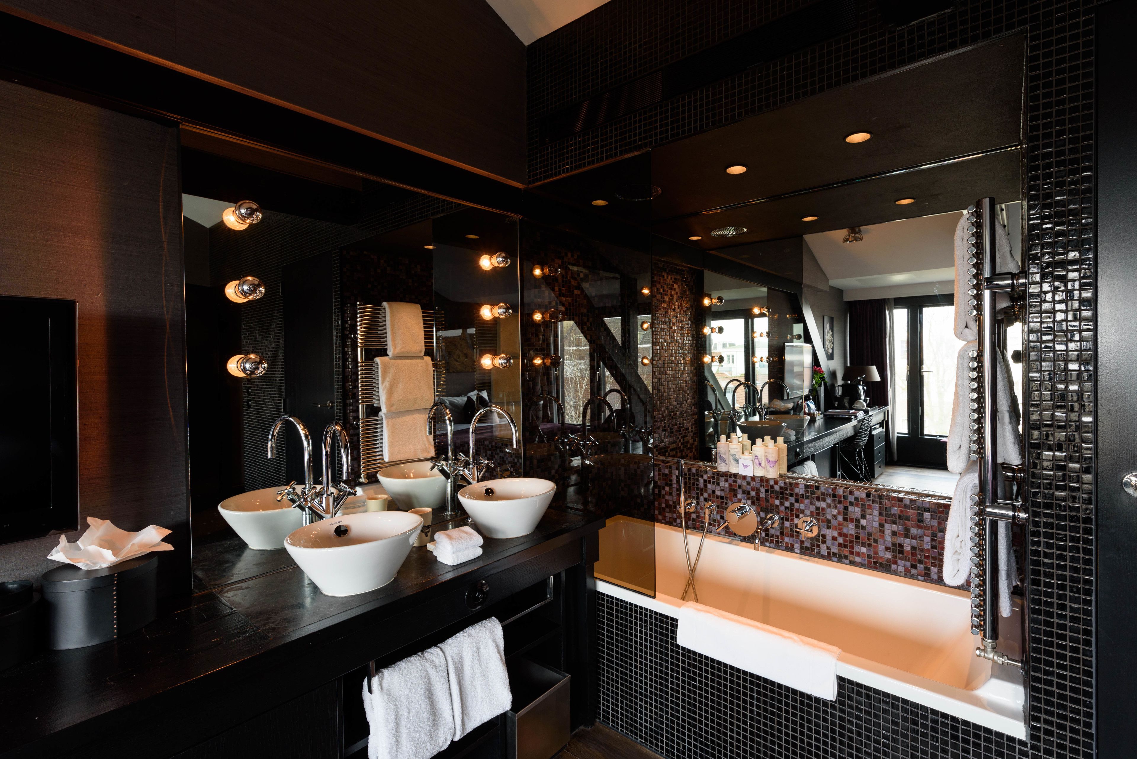 deluxe double room | bathroom | designer toiletries, hair dryer, bathrobes, slippers