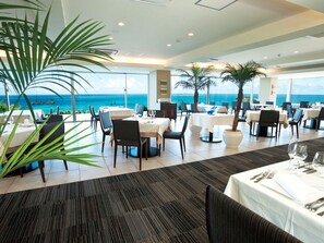 Breakfast, lunch, dinner served; Fusion cuisine, sea views 