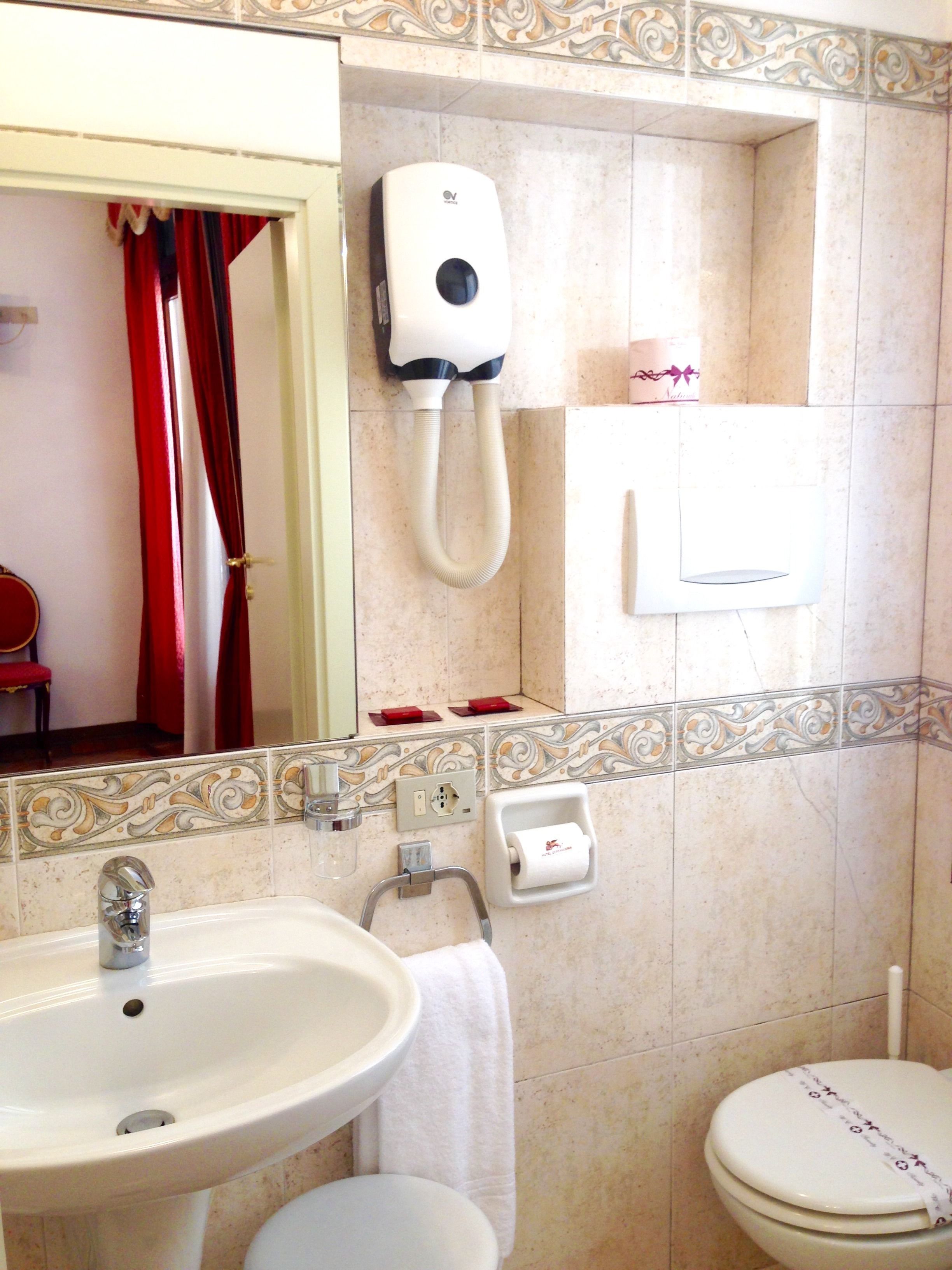 standard double room | bathroom | hair dryer, towels