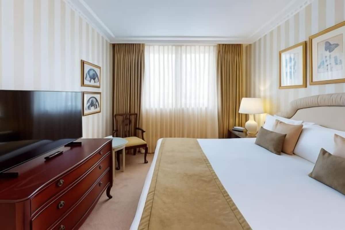 In-room safe, desk, blackout curtains, iron/ironing board