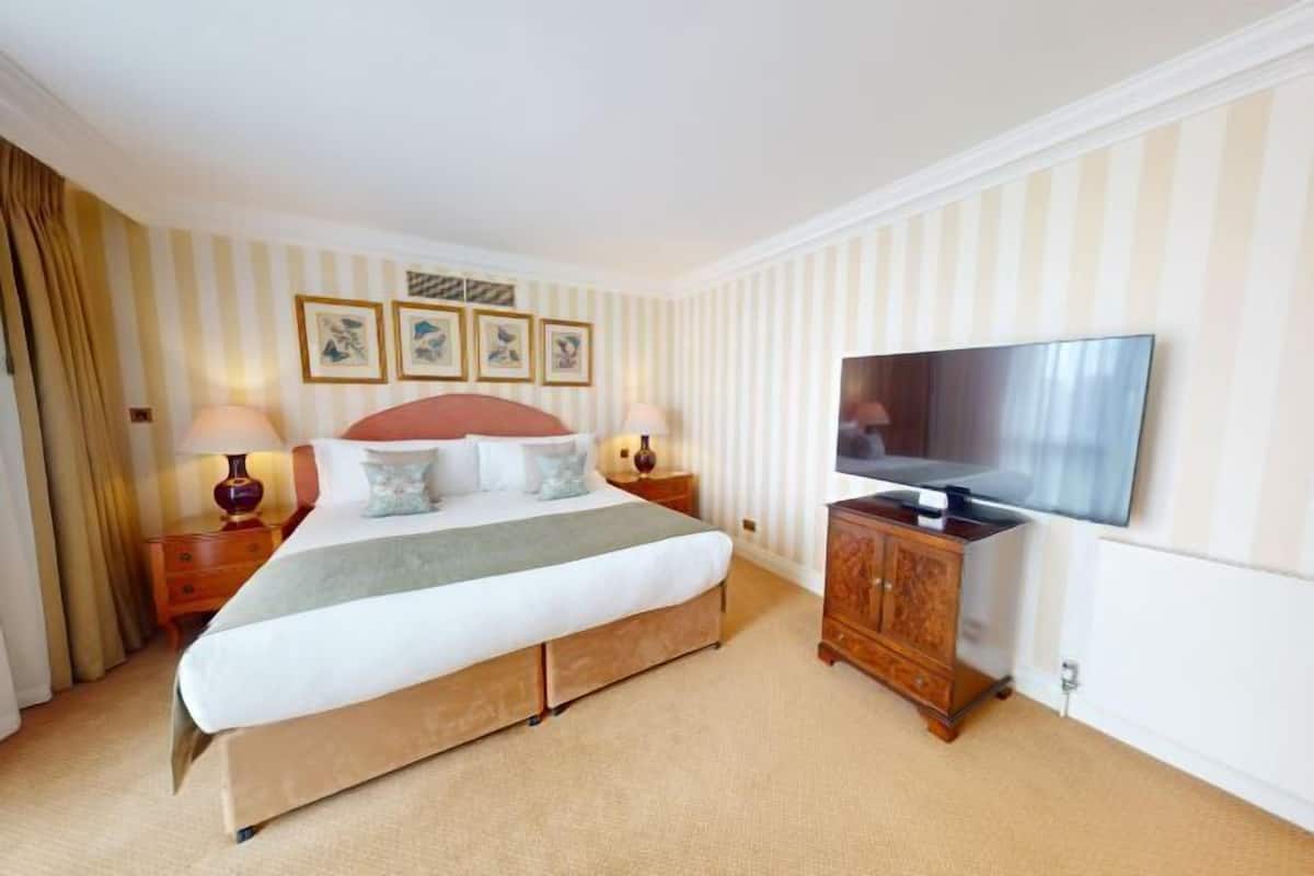 In-room safe, desk, blackout curtains, iron/ironing board