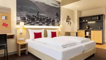 Premium bedding, in-room safe, blackout drapes, soundproofing