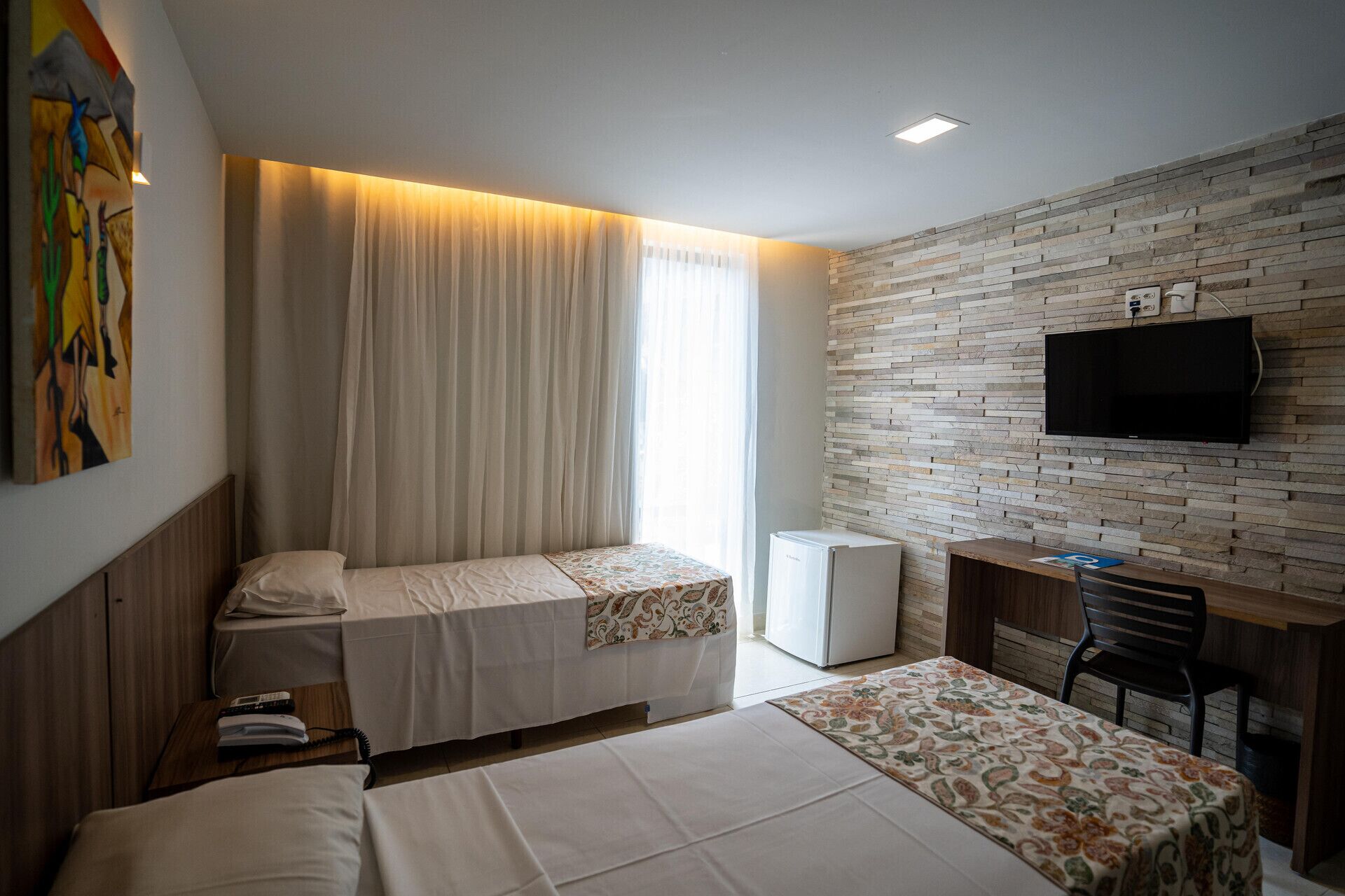 In-room safe, desk, blackout drapes, free cribs/infant beds