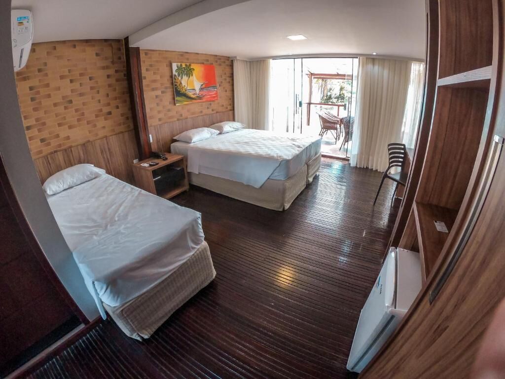 Suíte estúdio conforto | Cofres nos quartos, escrivaninha, cortinas blackout, berços grátis