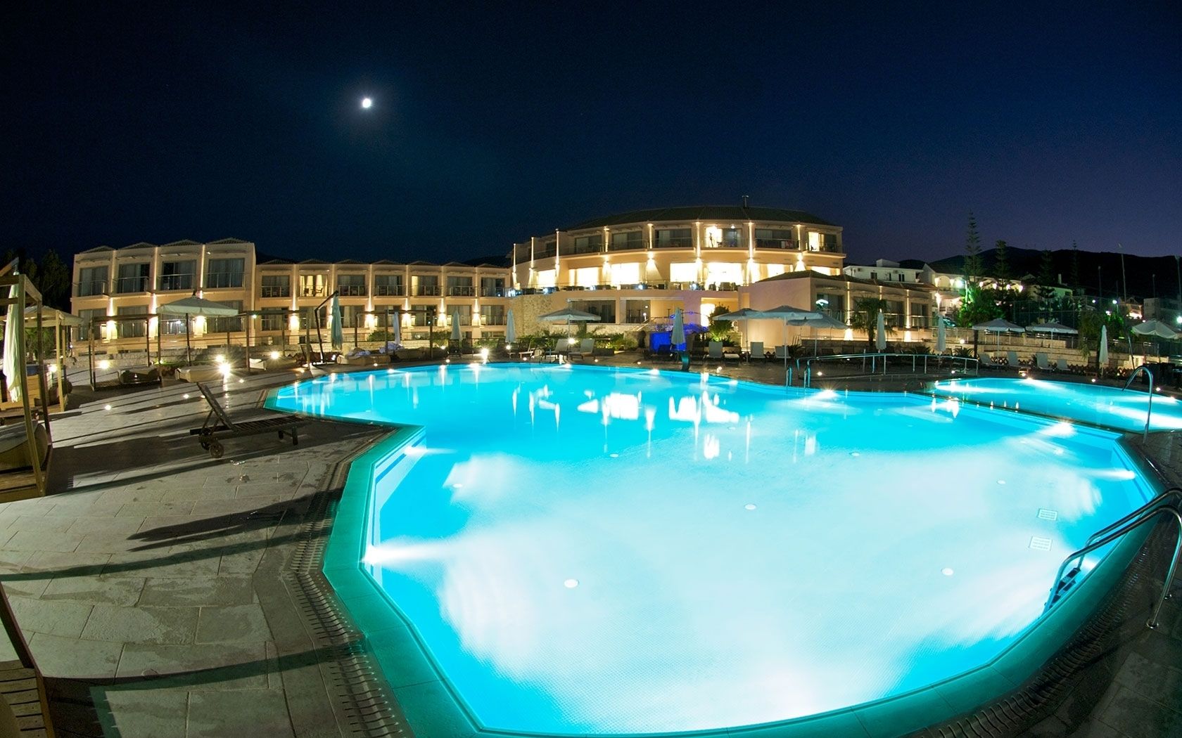 seasonal outdoor pool, open 8:00 am to 7:00 pm, free pool cabanas