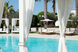 Outdoor pool, open 9:30 AM to 7:30 PM, sun loungers