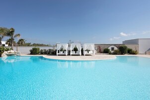 Outdoor pool, open 9:30 AM to 7:30 PM, sun loungers