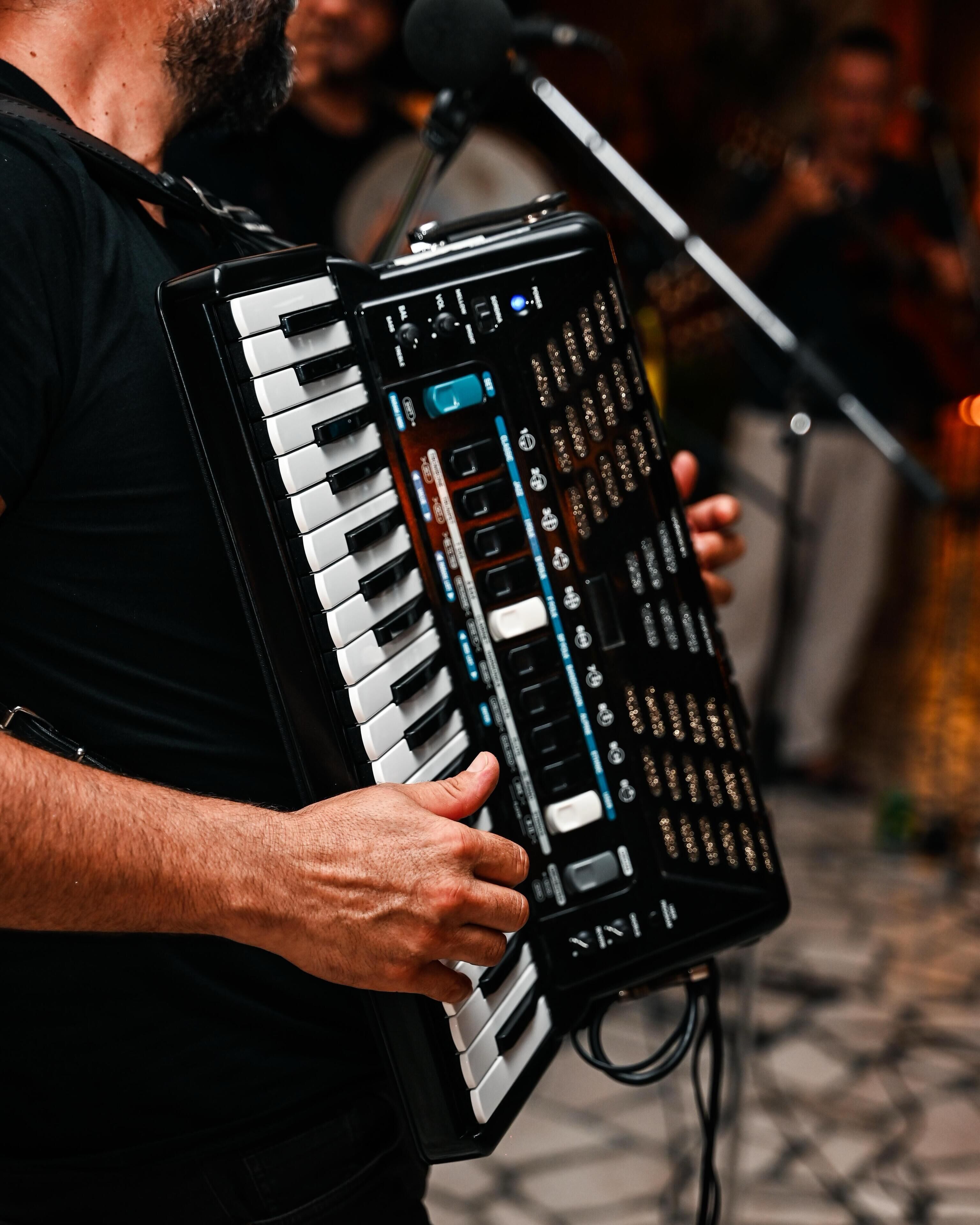 A person playing a keyboard instrument.