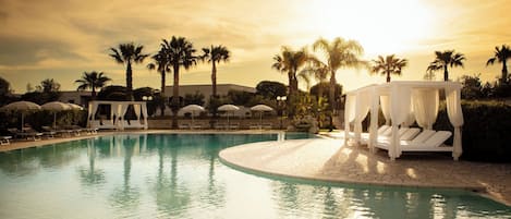 Outdoor pool, open 9:30 AM to 7:30 PM, sun loungers