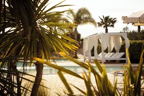 Outdoor pool, open 9:30 AM to 7:30 PM, sun loungers