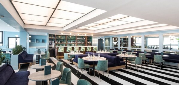 Breakfast, lunch, dinner served; French cuisine, beach views 