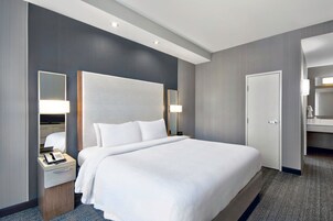 Hypo-allergenic bedding, pillow-top beds, in-room safe, desk
