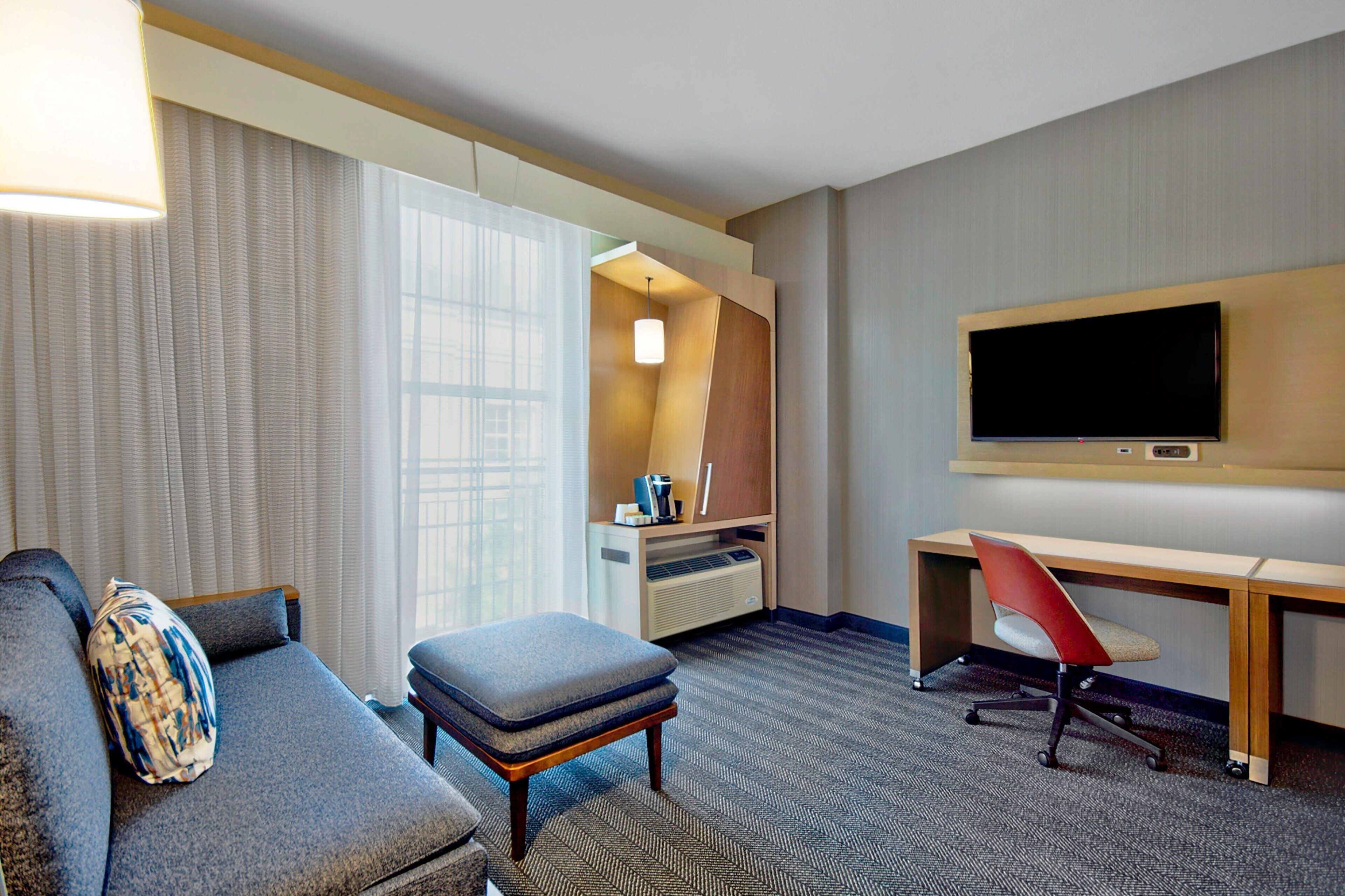 hypo-allergenic bedding, pillow-top beds, in-room safe, desk