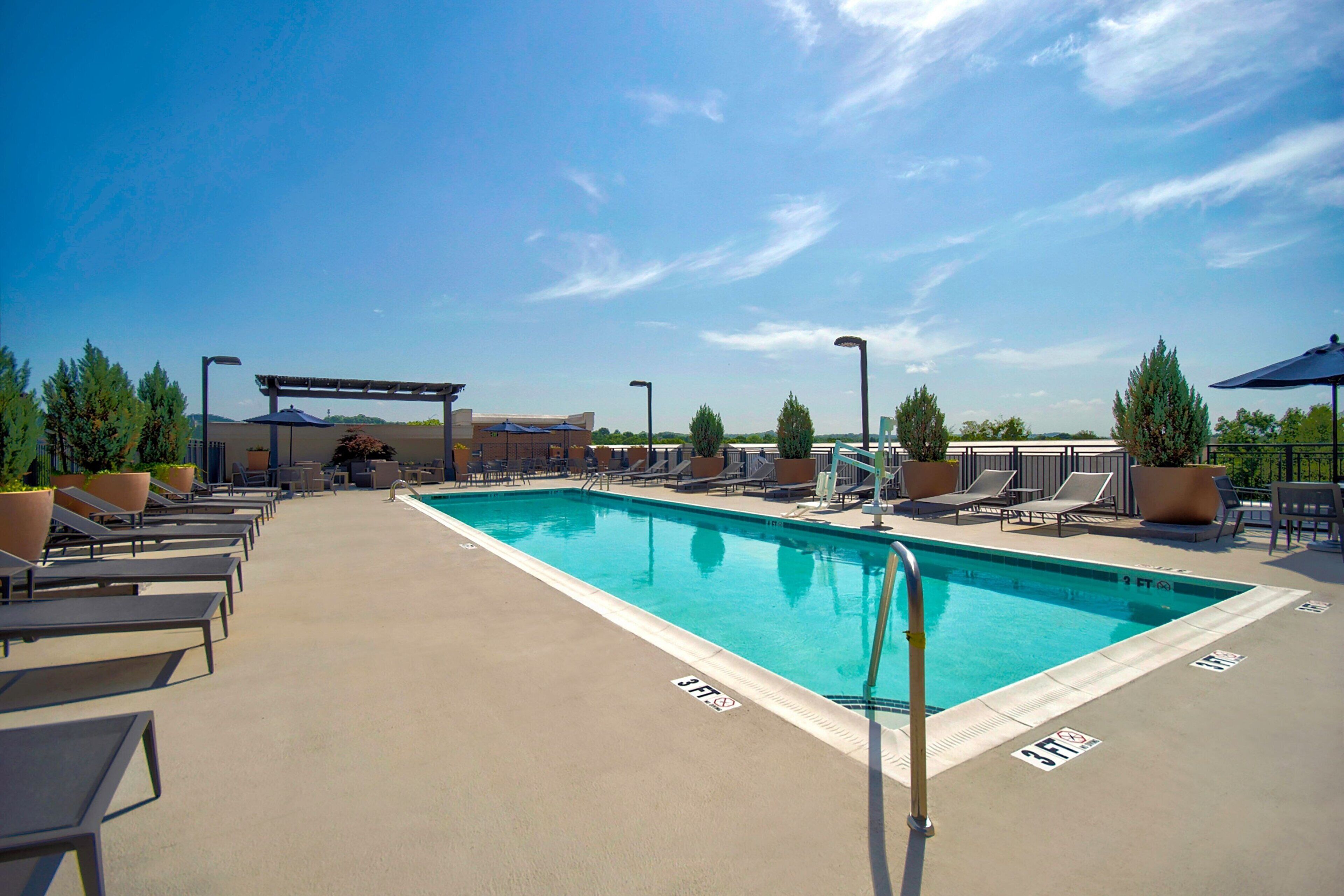 seasonal outdoor pool, open 8:00 am to 10:00 pm, free pool cabanas