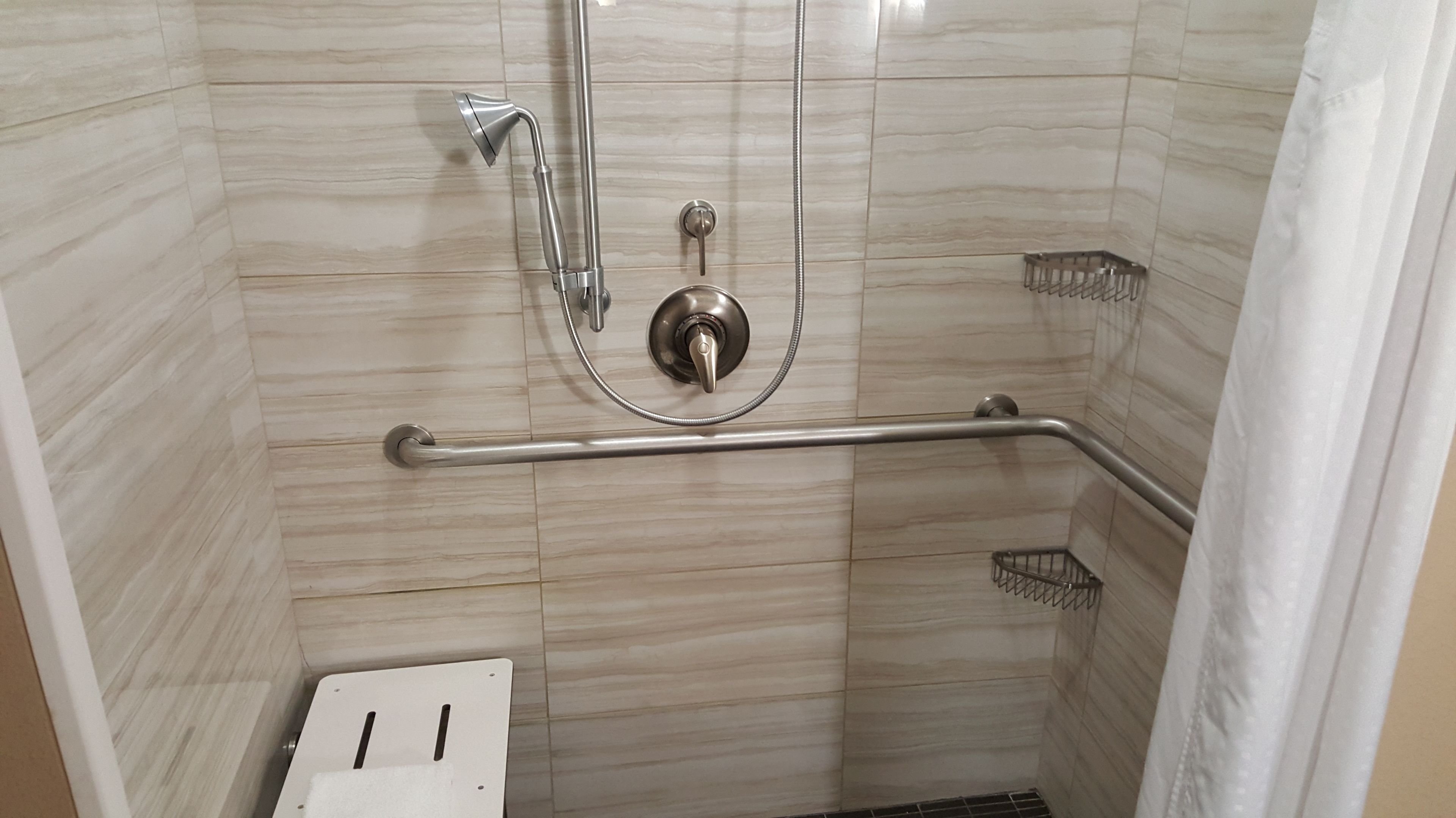 combined shower/bathtub, free toiletries, hair dryer, towels