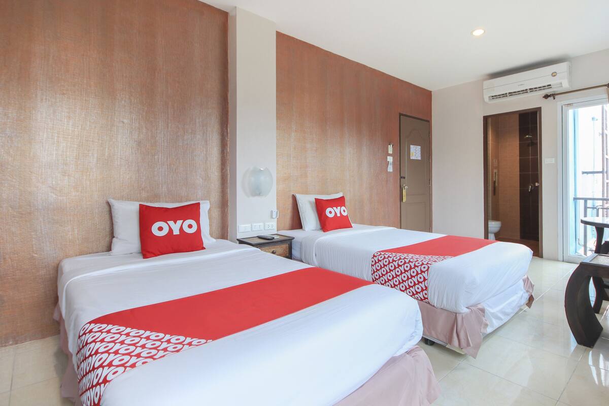 Habitación Deluxe con 2 camas individuales | Escritorio, wifi gratis y ropa de cama