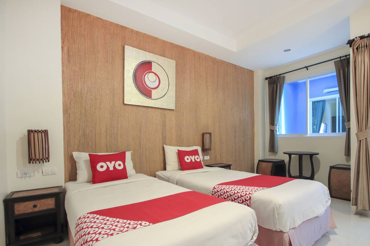 Habitación superior con 2 camas individuales | Escritorio, wifi gratis y ropa de cama