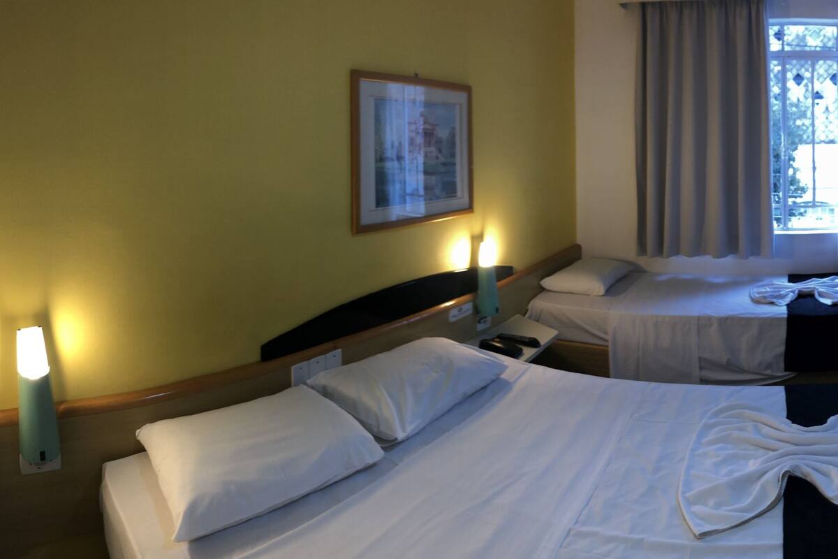 Family Triple Room, Multiple Beds | Blackout curtains, iron/ironing board (on request), free WiFi