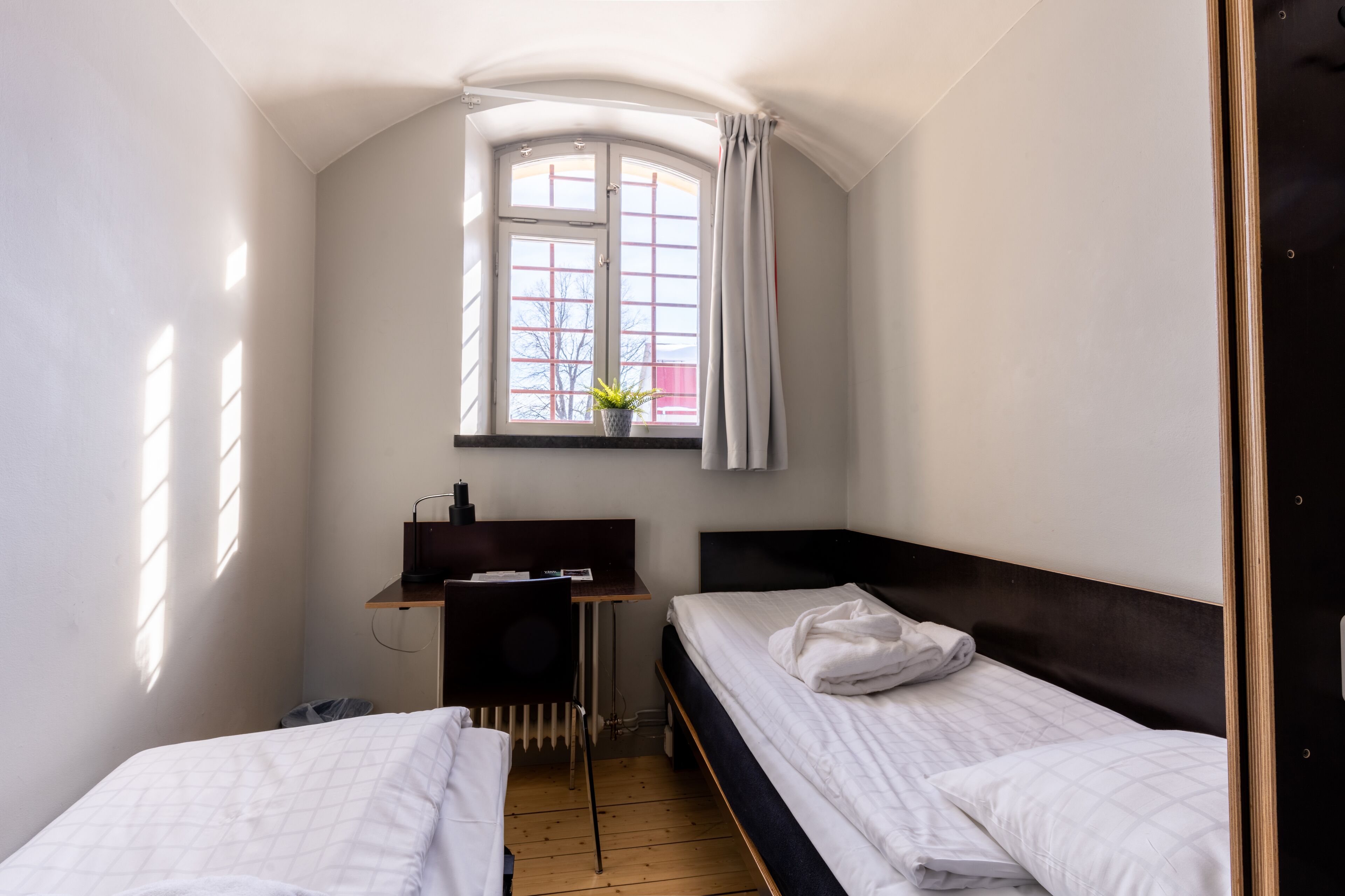 economy twin room, shared bathroom | 1 bedroom, hypo-allergenic bedding, desk, blackout curtains