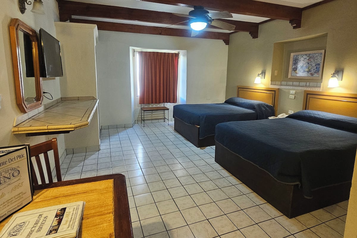 Executive Suite | Blackout curtains, iron/ironing board, free WiFi, bed sheets