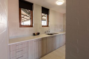 Apartment | Private kitchenette | Fridge, coffee/tea maker, electric kettle - Nightcap at Wintersun Hotel (Bluff Point)