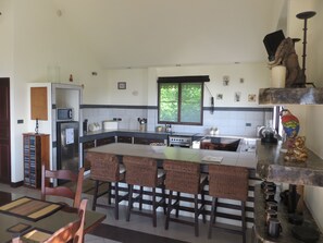 Fridge, stovetop, coffee/tea maker, electric kettle