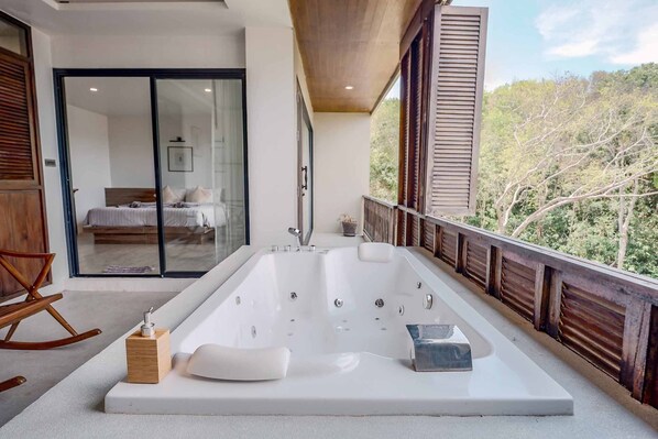Forest Suite (Jacuzzi) | Bathroom | Shower, hair dryer, towels, soap