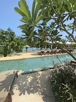 2 outdoor pools, open 10:00 AM to 6:00 PM, pool umbrellas, sun loungers