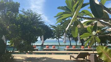 2 outdoor pools, open 10:00 AM to 6:00 PM, pool umbrellas, pool loungers