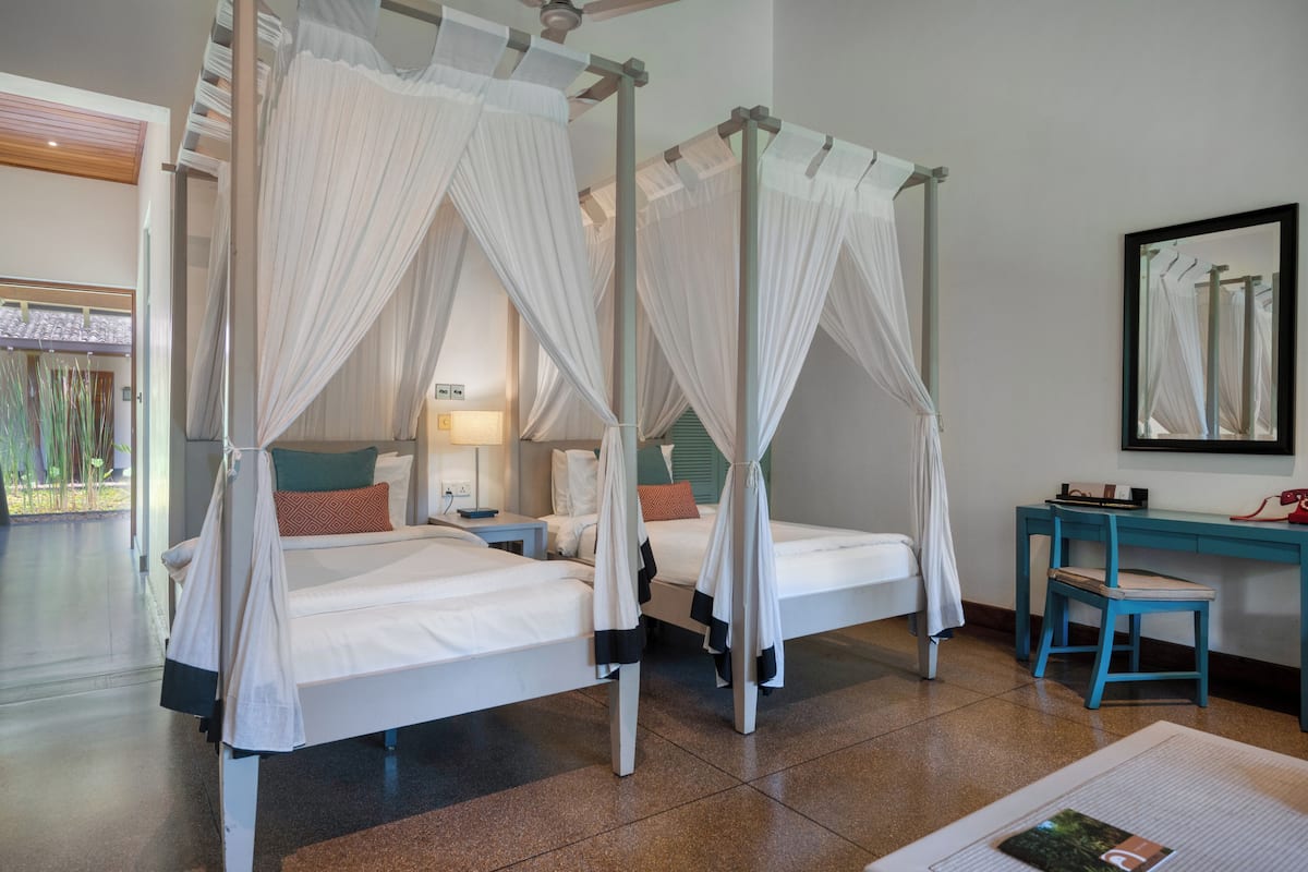 Suite (Twin, Garden) | In-room safe, individually decorated, desk, blackout drapes