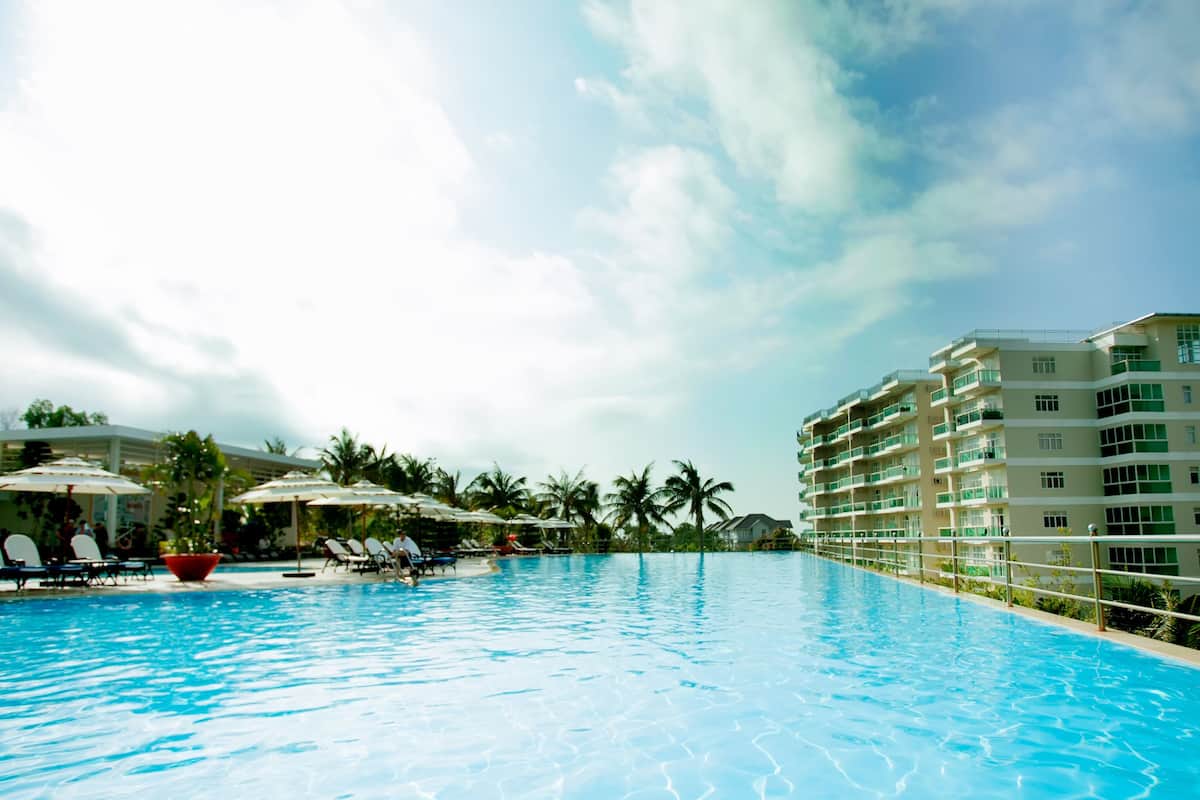 outdoor pool, pool umbrellas, pool loungers