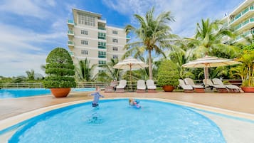 Outdoor pool, pool umbrellas, pool loungers