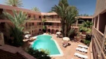 Outdoor pool, pool umbrellas, pool loungers