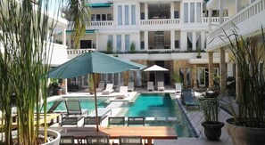 Outdoor pool, pool umbrellas, pool loungers