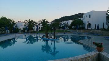 Outdoor pool, pool umbrellas, pool loungers