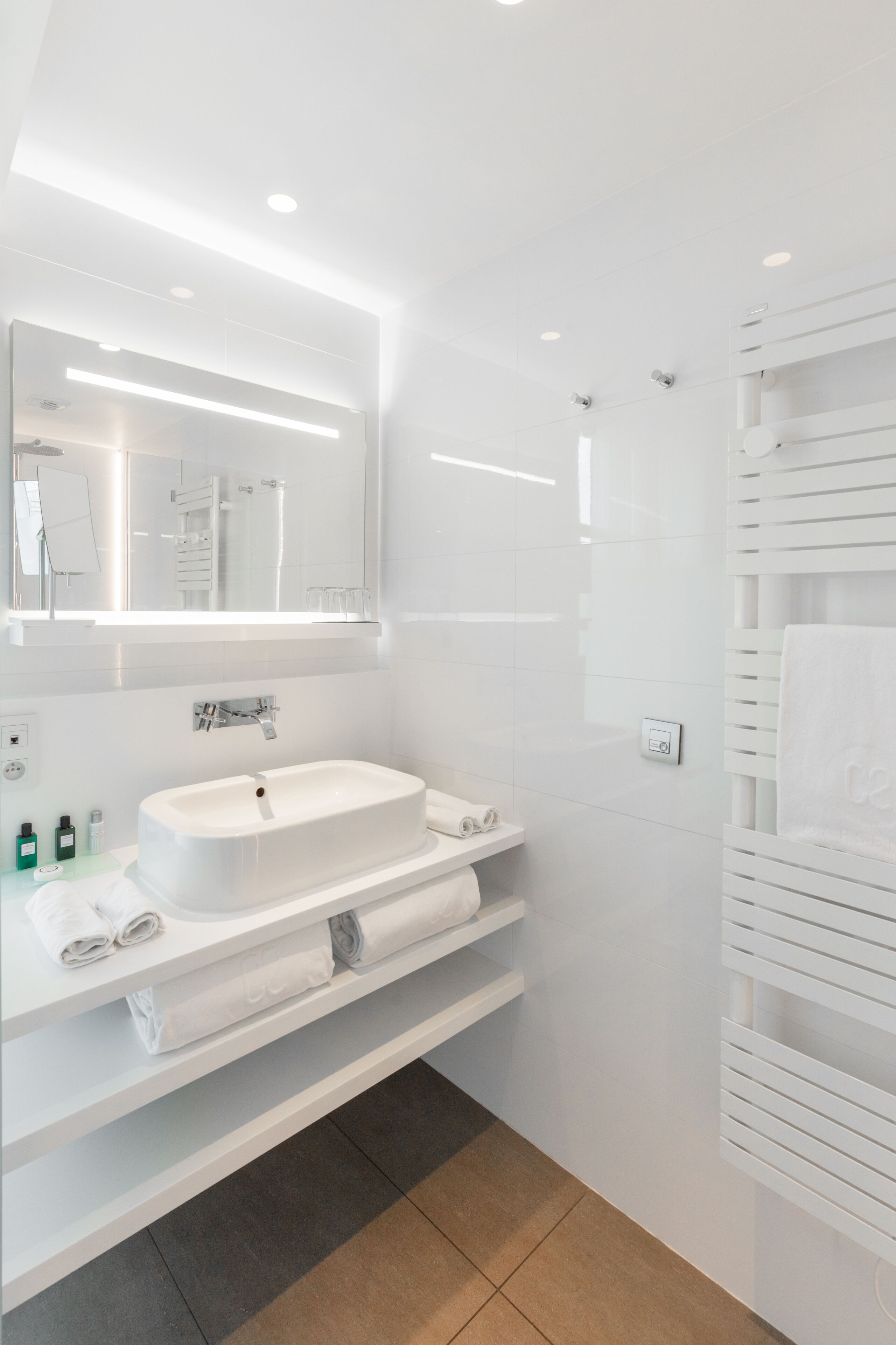 superior room | bathroom | designer toiletries, hair dryer, bathrobes, slippers