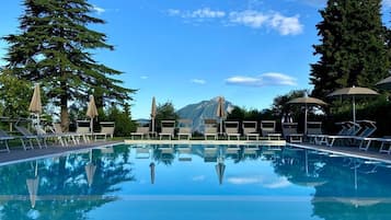 Outdoor pool, open 8:00 AM to 7:00 PM, pool umbrellas, pool loungers