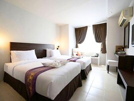 In-room safe, blackout drapes, WiFi (free), bed sheets