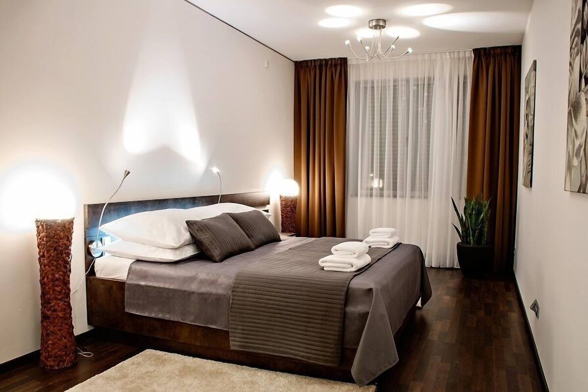 Apartamento executivo, 2 quartos (4 pax) | Cofres nos quartos, escrivaninha, quartos à prova de som