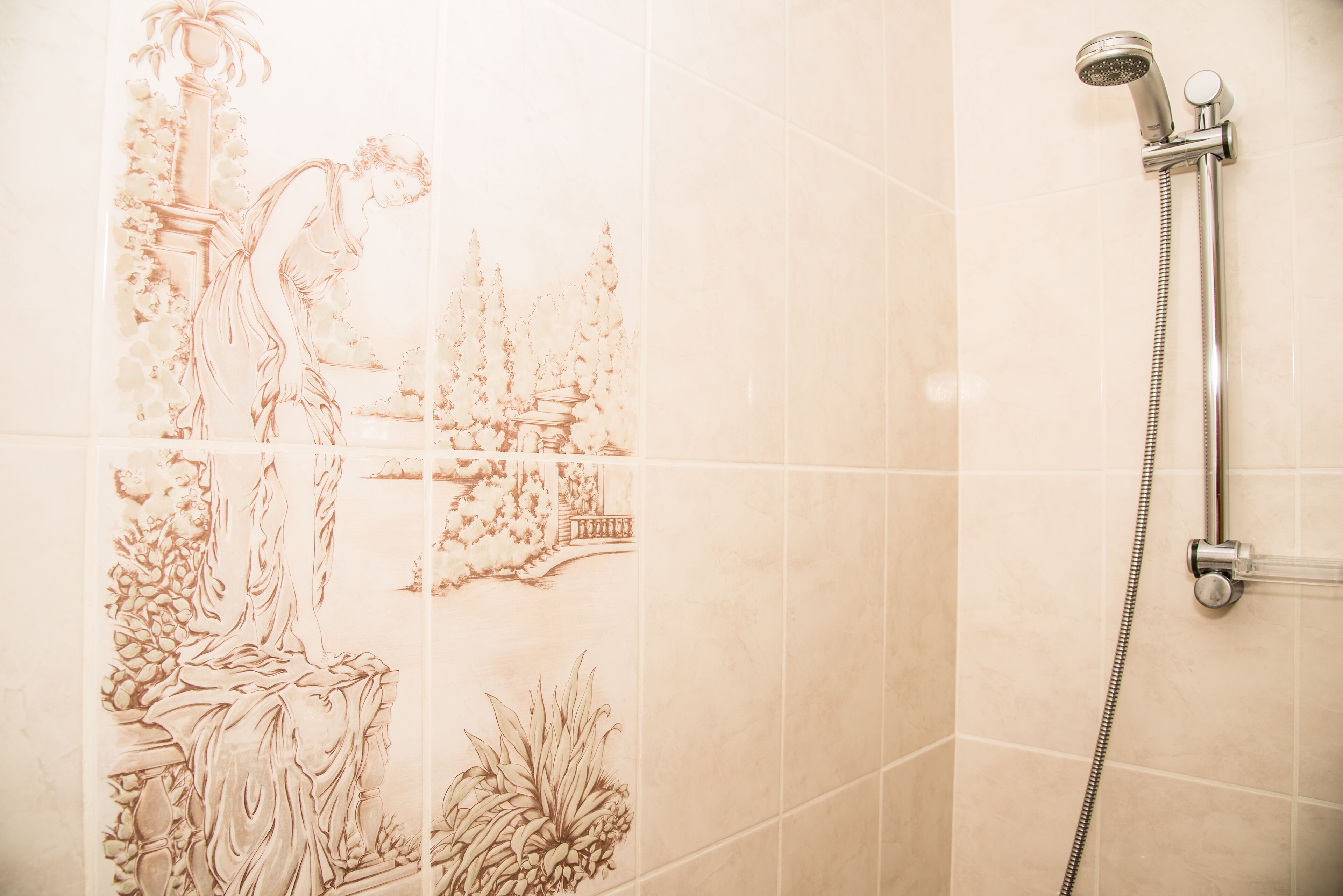 superior double room, 1 queen bed, garden view, garden area | bathroom | combined shower/bathtub, free toiletries, hair dryer, towels