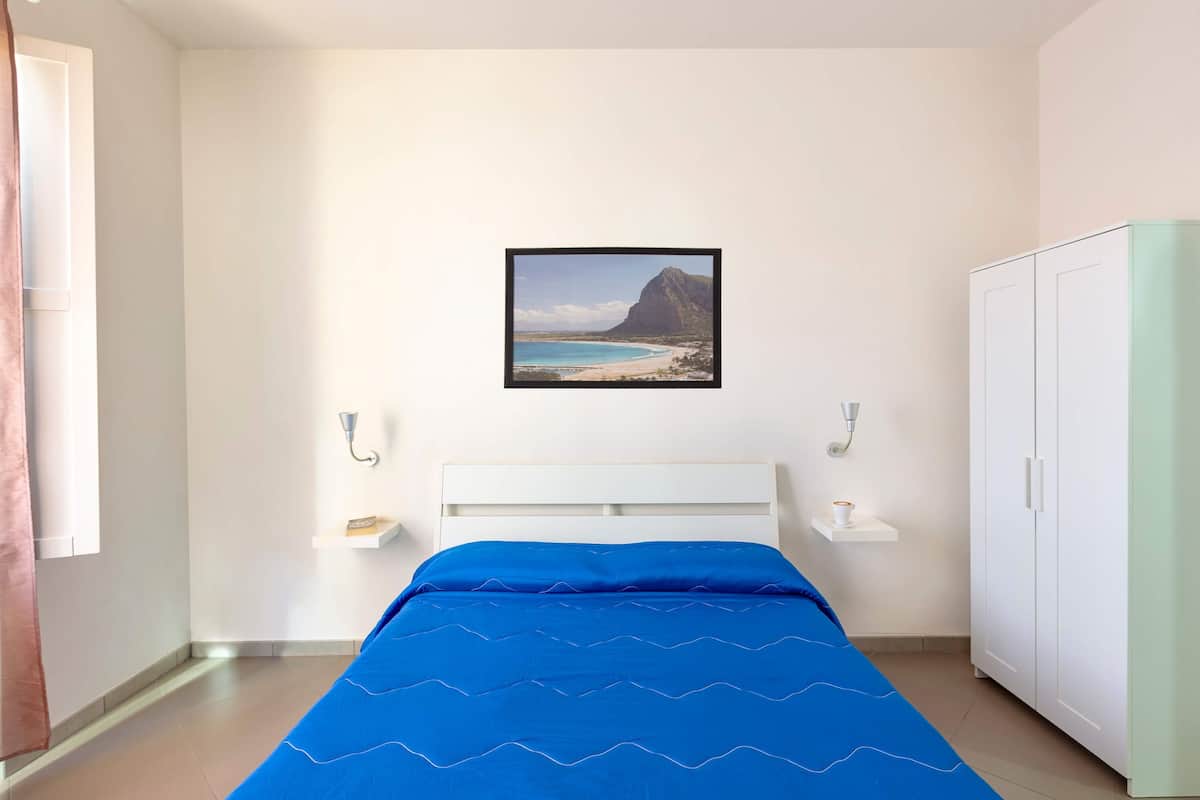 Family Triple Room, 2 Bedrooms, Private Bathroom, Partial Sea View | Premium bedding, down comforters, iron/ironing board (on request)