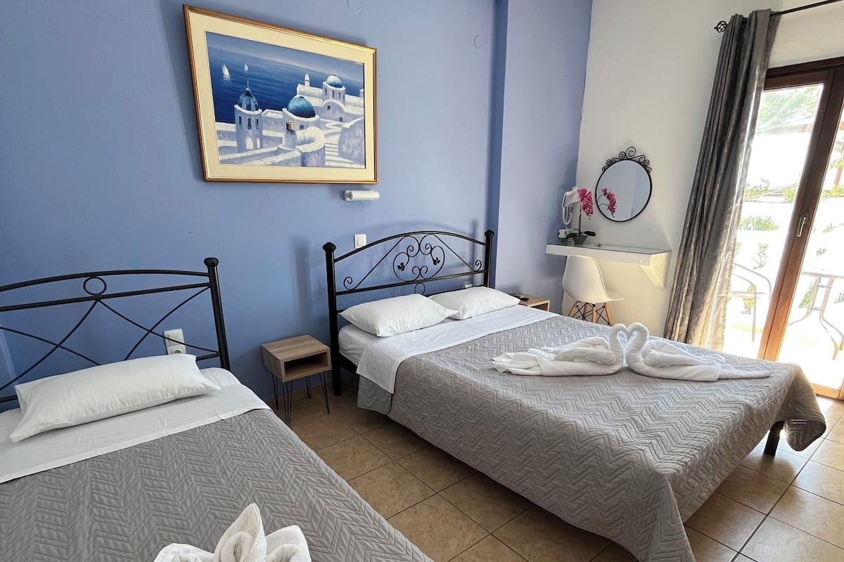 Family Studio, Balcony, Sea View | Laptop workspace, blackout curtains, free WiFi, bed sheets