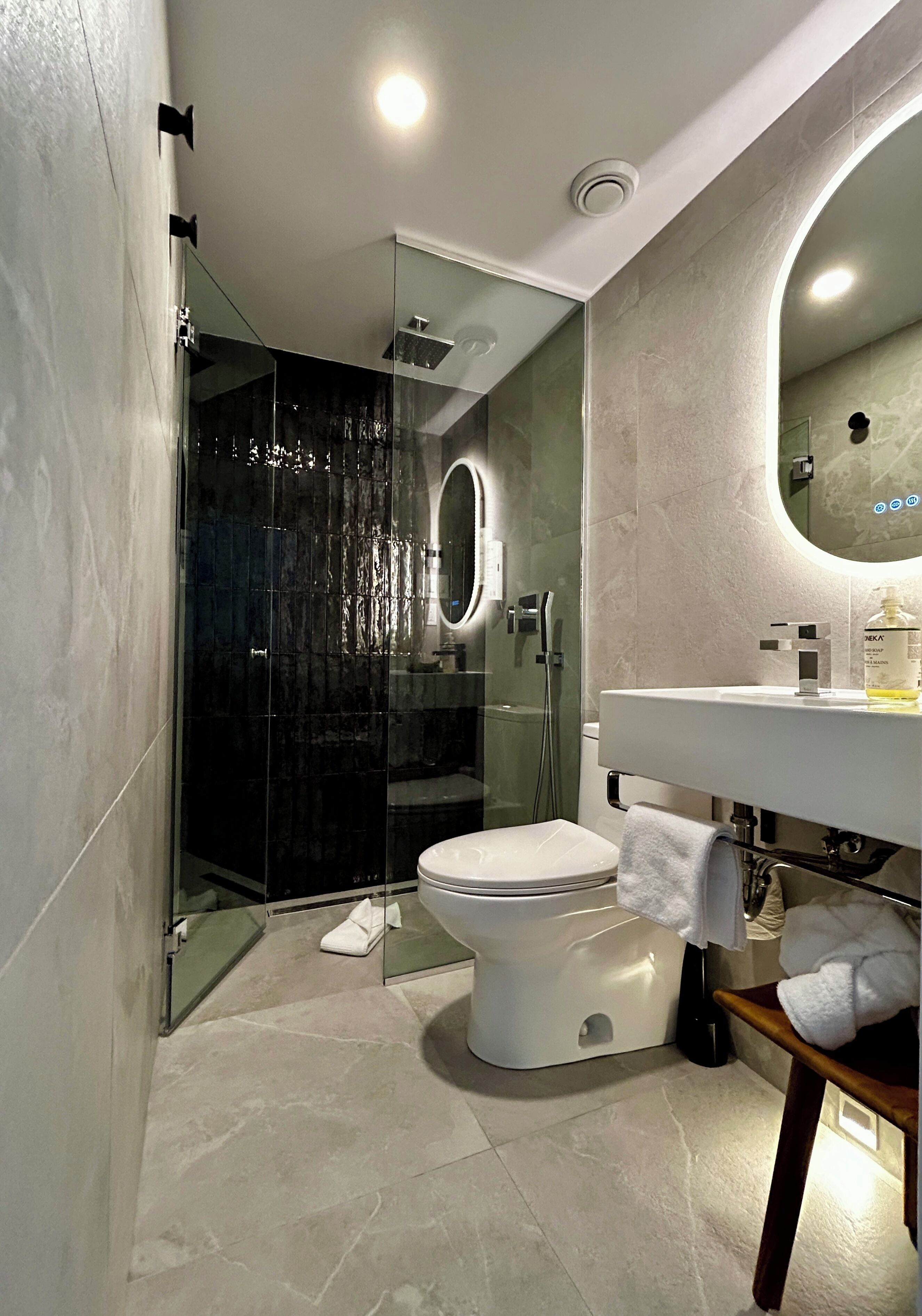 thematic room, 1 queen bed | bathroom | designer toiletries, hair dryer, heated floors, towels