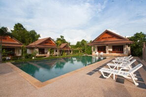 Outdoor pool, pool umbrellas, sun loungers